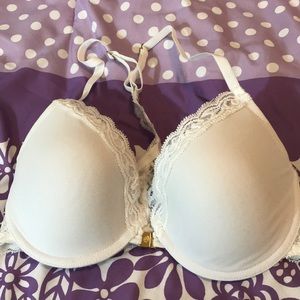 White Natori racerback bra with front clasp.